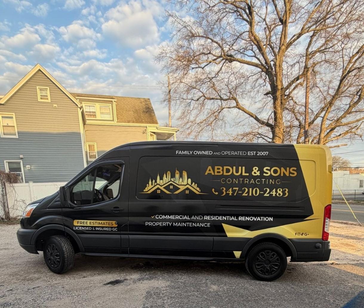Abdul & Sons Contracting van with completed black and gold commercial wrap