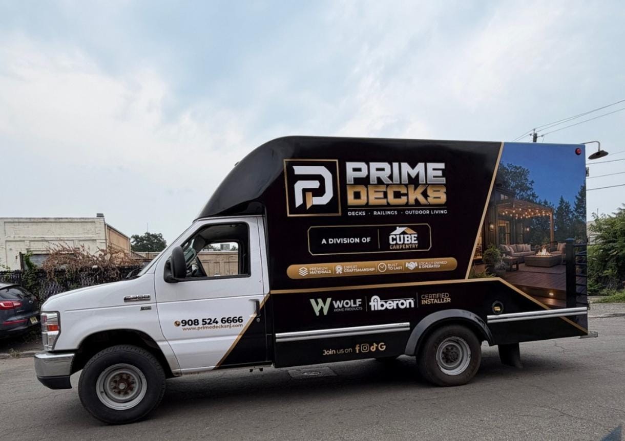 Prime Decks box truck with completed black, gold and white commercial wrap