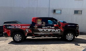 Best Top Roofing pickup with completed black and red commercial wrap