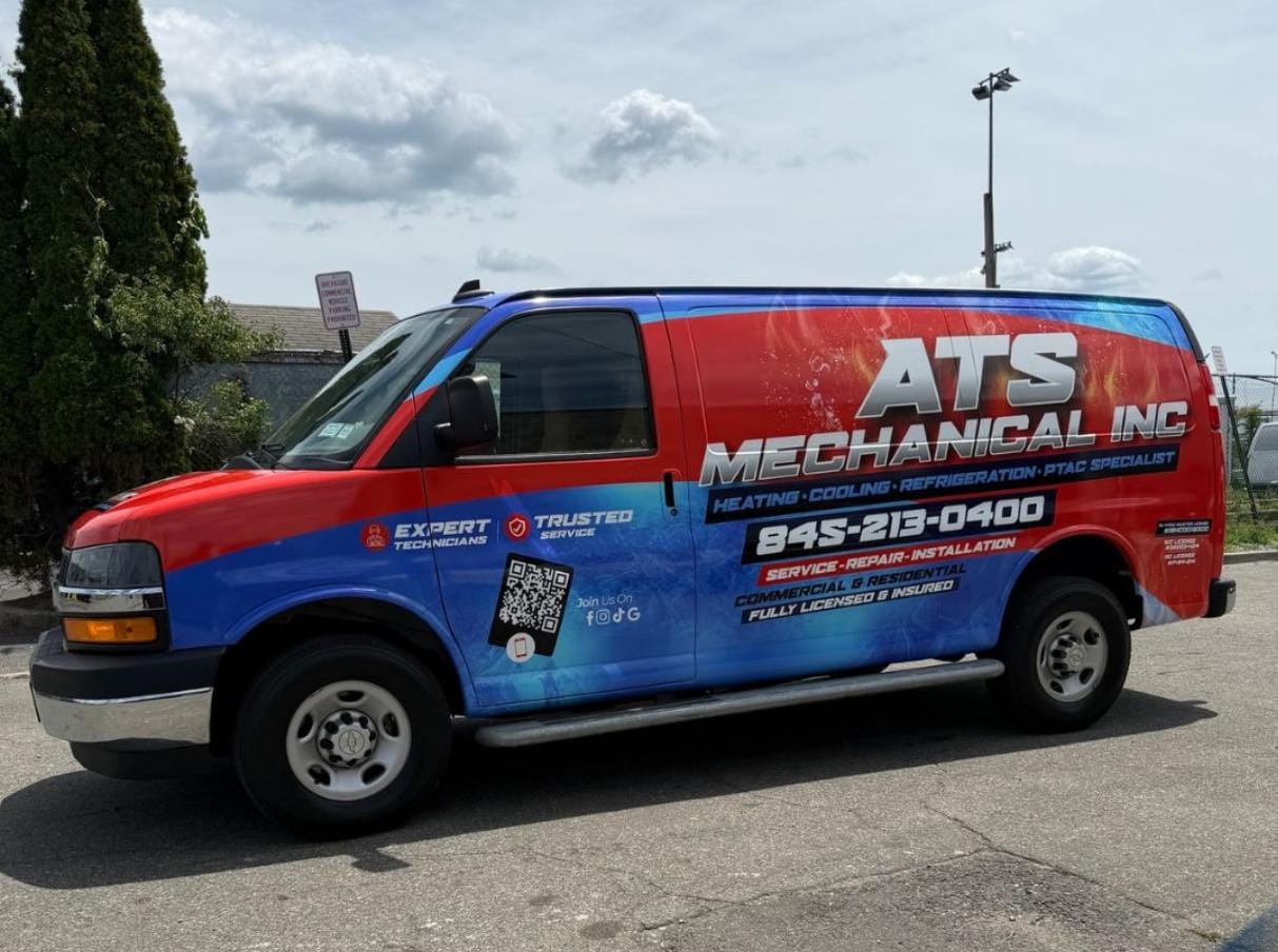 ATS Mechanical Inc service van with completed red and blue full wrap