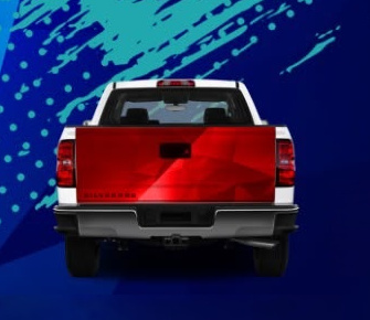 Rear view of a short bed pickup showing three-quarter and full wrap coverage