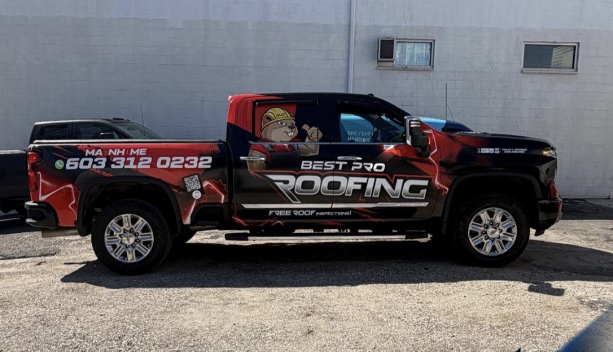 Best Pro Roofing pickup with completed black and red commercial wrap